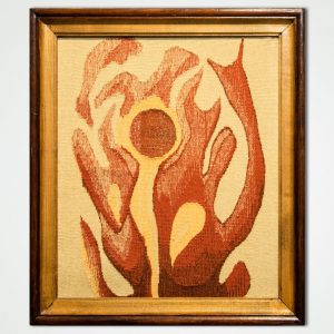 hand woven textile wall panel in a frame sun